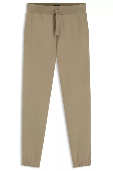 Embroidered-logo tracksuit bottoms in cotton terry