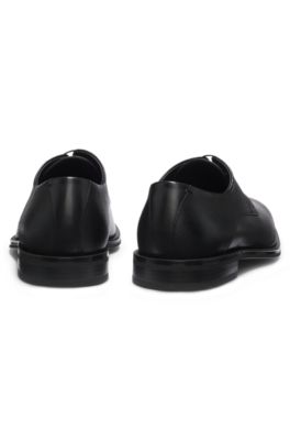 Derby shoes in textured and smooth leather, Black