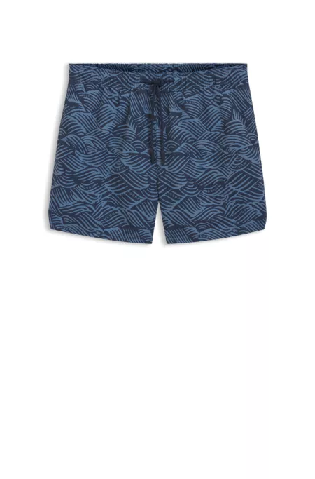 Swim shorts with logo artwork