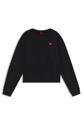 Sudadera unisex en felpa de algod&oacute;n con logo de coraz&oacute;n, Negro