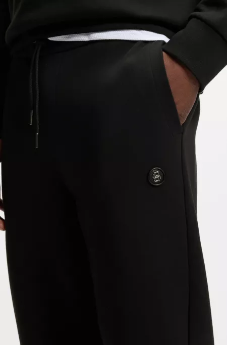 Cotton-blend track pants with Double B monogram badge