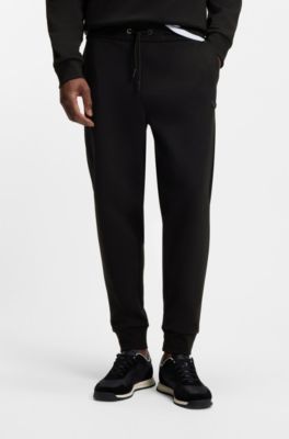 Pantalones de ch&aacute;ndal de algod&oacute;n con insignia con monograma Double&nbsp;B, Negro