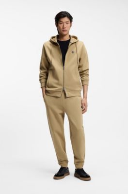 Pantalones de ch&aacute;ndal de algod&oacute;n con insignia con monograma Double&nbsp;B, Caqui