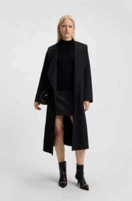 Minifalda de boucl&eacute; brillante con ribete de cadena, Negro