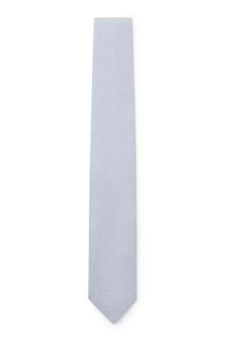 Tie with jacquard pattern