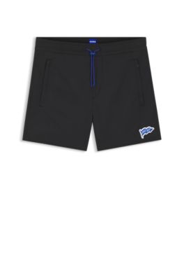 Water-repellent shorts with flag logo, Black