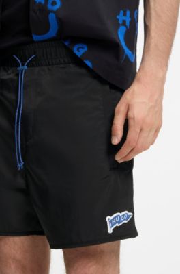 Water-repellent shorts with flag logo, Black