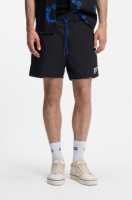 Water-repellent shorts with flag logo, Black