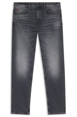 Jeans slim fit en c&oacute;modo denim el&aacute;stico gris, Gris