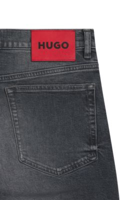 Jeans slim fit en c&oacute;modo denim el&aacute;stico gris, Gris