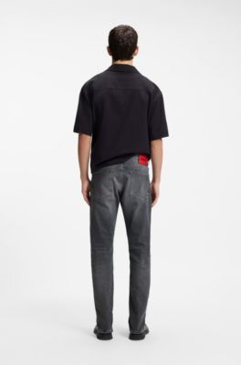 Jeans slim fit en c&oacute;modo denim el&aacute;stico gris, Gris