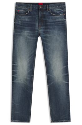 Jeans slim fit en denim el&aacute;stico azul oscuro desgastado, Azul