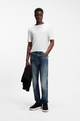 Jeans slim fit en denim el&aacute;stico azul oscuro desgastado, Azul