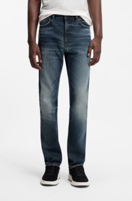Jeans slim fit en denim el&aacute;stico azul oscuro desgastado, Azul