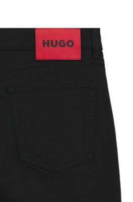 Black tapered-fit jeans in thermo-regulating denim, Black