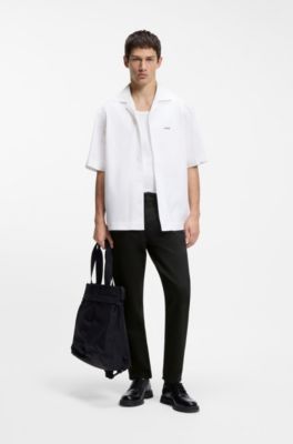 Black tapered-fit jeans in thermo-regulating denim, Black
