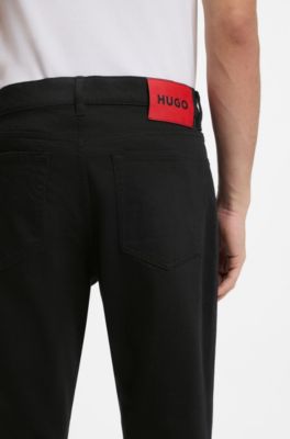 Black tapered-fit jeans in thermo-regulating denim, Black