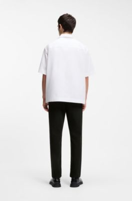 Black tapered-fit jeans in thermo-regulating denim, Black