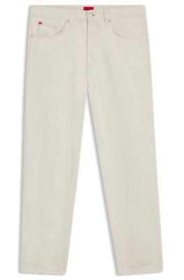 Vaqueros relaxed tapered fit de denim crudo, Blanco