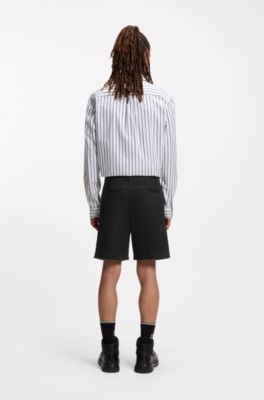 Shorts slim fit de sarga de algod&oacute;n el&aacute;stico, Negro