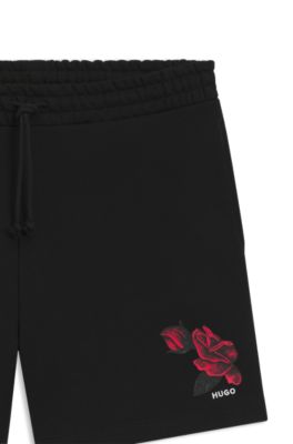 Shorts de felpa de algod&oacute;n con ilustraci&oacute;n de rosas, Negro
