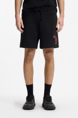 Shorts de felpa de algod&oacute;n con ilustraci&oacute;n de rosas, Negro