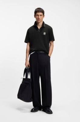 Logo-artwork polo shirt with blanket stitching, Black