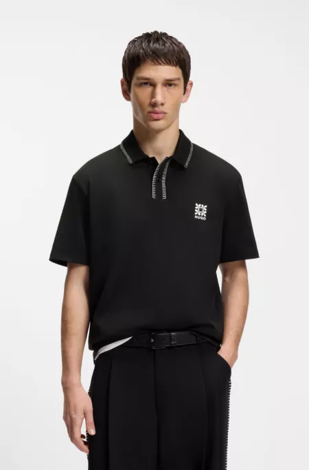 Logo-artwork polo shirt with blanket stitching