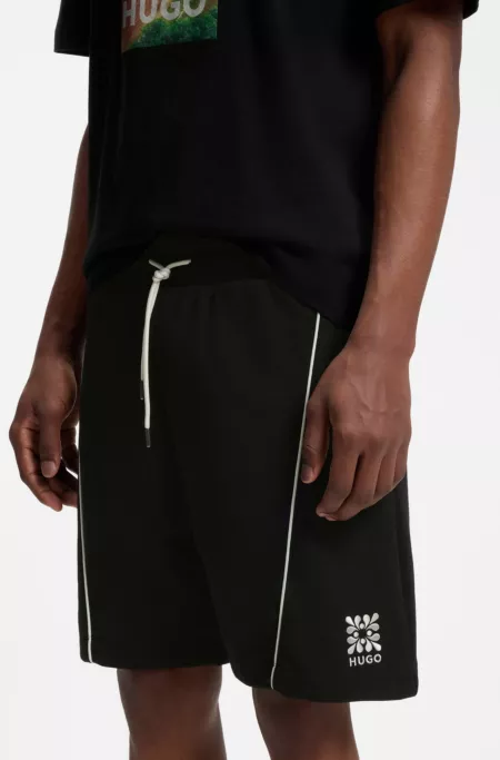 Cotton-blend shorts with embroidered logo artwork