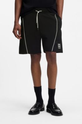 Shorts de algod&oacute;n con ilustraci&oacute;n de logo bordado, Negro