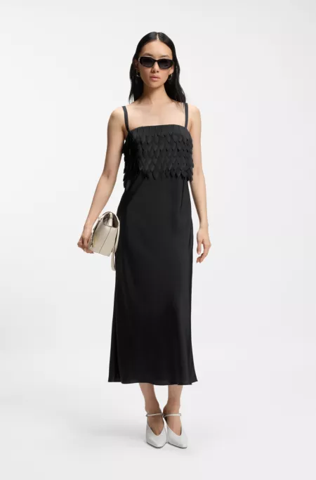 Strappy dress with laser-cut shapes