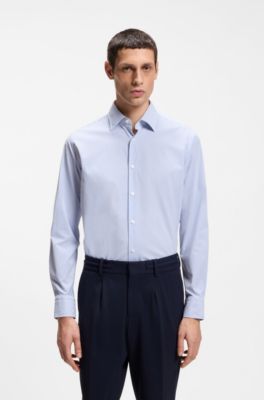 Camisa regular fit en tejido el&aacute;stico t&eacute;cnico a rayas, Celeste