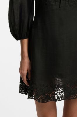 Robe coupe &eacute;vas&eacute;e avec d&eacute;tails brod&eacute;s, Noir