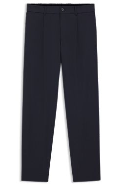 Pantalones tapered fit de tejido elástico técnico lavable