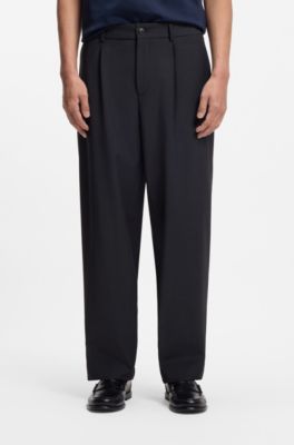 Pantalones tapered fit de tejido el&aacute;stico t&eacute;cnico lavable, Azul oscuro