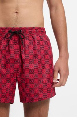 Ba&ntilde;ador tipo shorts de secado r&aacute;pido con estampado de cuadros con logo apilado, Rosa claro