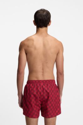 Ba&ntilde;ador tipo shorts de secado r&aacute;pido con estampado de cuadros con logo apilado, Rosa claro