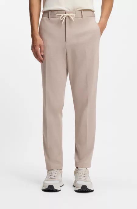Tapered-fit trousers with reversible drawstring