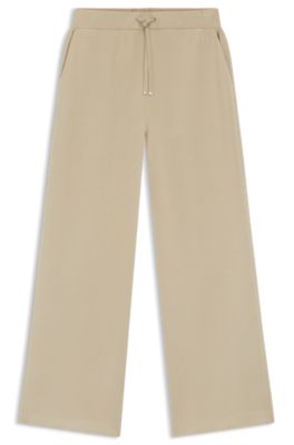 Pantalones de ch&aacute;ndal relaxed fit con monograma Double&nbsp;B, Beige claro