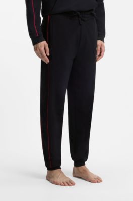 Contrast-piping tracksuit bottoms in stretch cotton, Black
