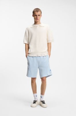 Polo de punto con estructura de rejilla y cuello abierto, Blanco