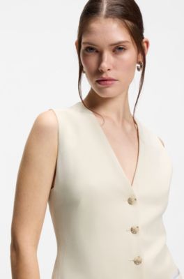Slim-fit blazer with sleeveless styling, White