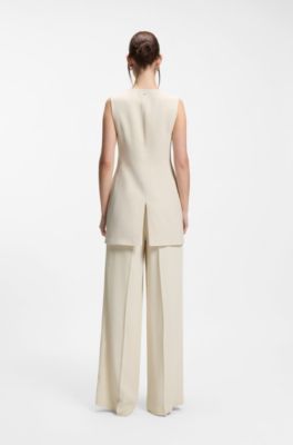 Slim-fit blazer with sleeveless styling, White