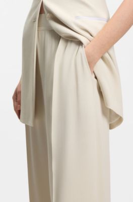 Pantalones relaxed fit en crep&eacute; fluido, Blanco