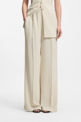 Pantalones relaxed fit en crep&eacute; fluido, Blanco