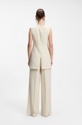 Pantalones relaxed fit en crep&eacute; fluido, Blanco