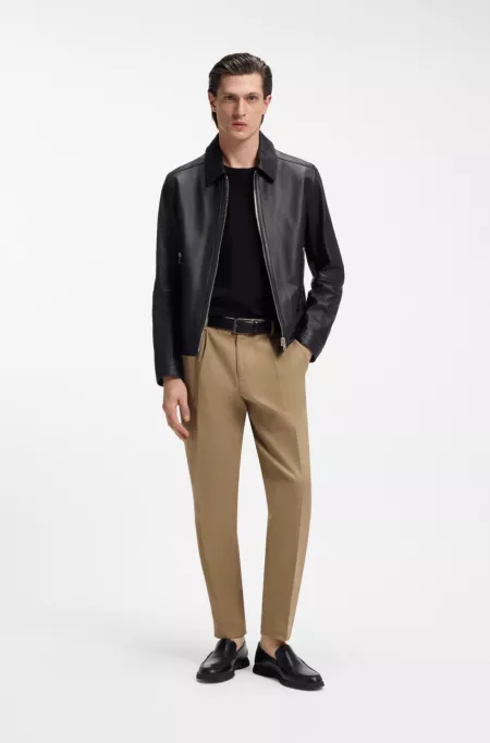 Embossed-logo moccasins in leather