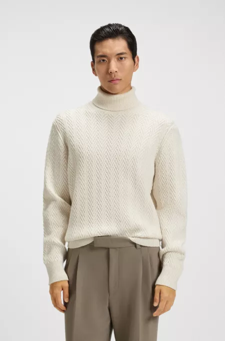 Rollneck sweater in herringbone virgin wool