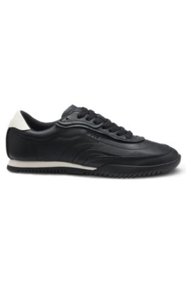 Embossed-logo trainers in leather, Black