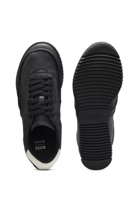Embossed-logo trainers in leather